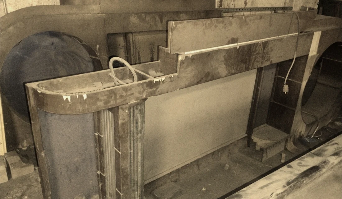 The curved wooden bar before its restoration